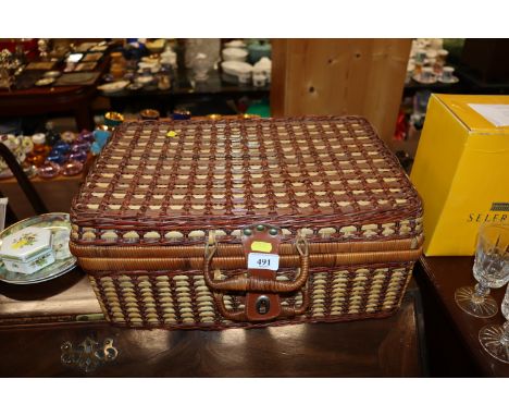 A wicker picnic hamper