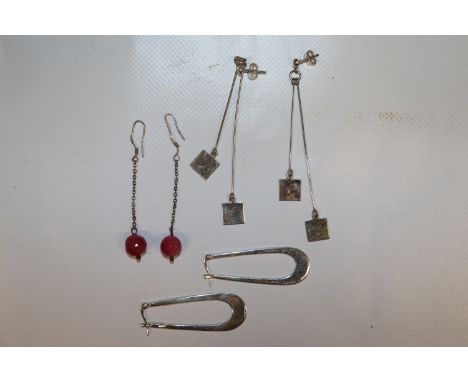 Three pairs of sterling silver long drop earrings including natural ruby