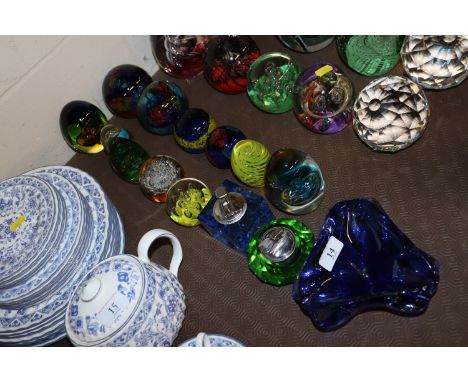 Various coloured glass paperweights, vintage table cigarette light, blue glass ashtray etc.