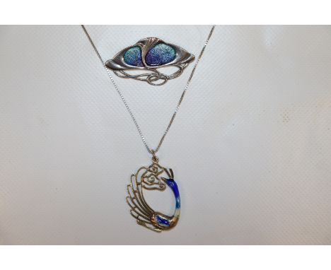 A hallmarked enamel Art Nouveau sterling silver pendant, similar peacock, AF