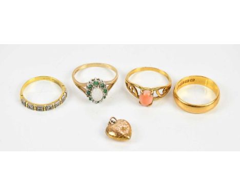 A 22ct yellow gold wedding band, size O, approximate weight 6.2g, a yellow metal illusion diamond set ring, size N, a yellow 