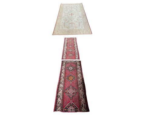 Three decorative rugs  Condition Report: The runners are sections of a larger runner / were possibly joined. The pattern does