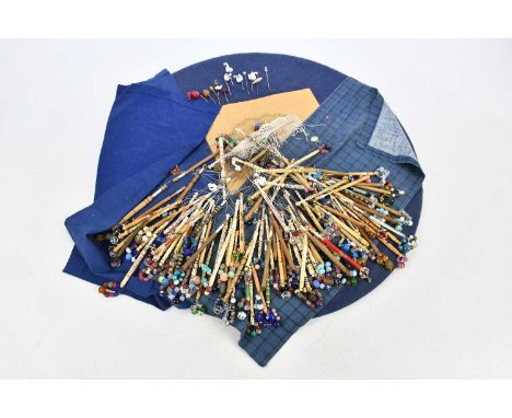 SEWING INTEREST; a large collection of bobbin/lace making tools and stick pins (qty). 