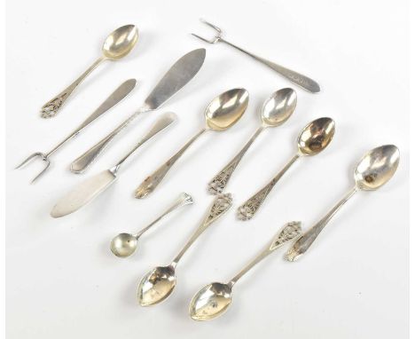 FRANCIS HOWARD LTD; a set of five Elizabeth II hallmarked silver teaspoons, with pierced thistles to the handles, Edinburgh 1