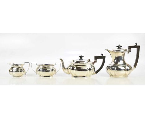 ROBERT CHANDLER; a George V hallmarked silver four piece tea service, Birmingham 1922, combined approx 41.32ozt/1286.3g (4).