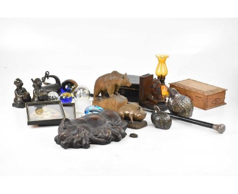 An assortment of collectors' items including bronzed resin figures, an ebonised walking cane with white metal ferrule, Japane
