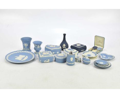 WEDGWOOD; a collection of blue and white jasperware including trinket boxes, lighter, plate, vases, etc (qty).