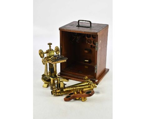 J SWIFT, LONDON; a 19th century brass binocular microscope, with assorted lens and accessories, (case af).