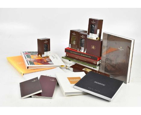 A collection of wristwatch catalogues and booklets, including Patek Philippe, Rolex, also a collection of assorted travel wat