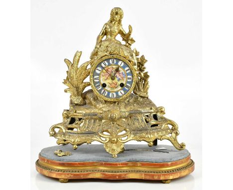 A circa 1900 French gilt metal and porcelain mantel clock, the porcelain face painted with cherubs and Roman numerals, inscri