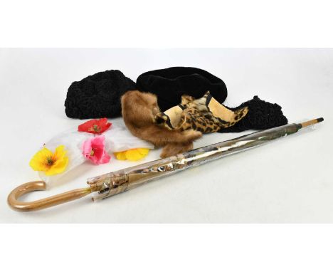 FORTNUM & MASON; an unusual vintage plastic hat cover with large multicoloured poppies, unworn, a black Persian lamb hat and 