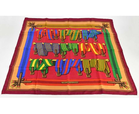 HERMÈS; a red and multicoloured 100% silk twill 'Les Sangles' or 'The Straps' scarf, first introduced in 1983 by artist Joach