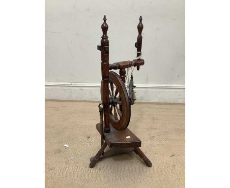 A country spinning wheel, height 84cmCondition Report: We are unable to ship this item or provide a quote for international s