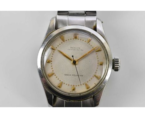 ROLEX; a gentleman's vintage Oyster Royal wristwatch, with baton markers to the circular dial, named inscription to the case 