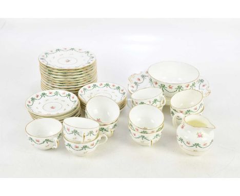 COALPORT; a floral decorated part tea service including cups, saucers, side plates, cream jug, serving plate. 