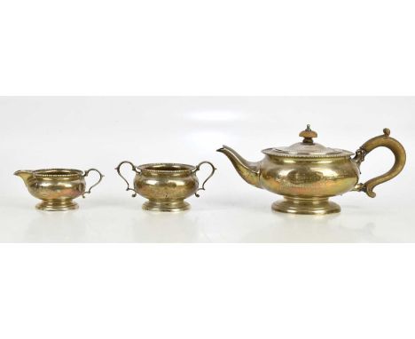 WILLIAM NEALE LTD; a George V hallmarked silver three piece tea service, Birmingham 1947, approximate weight 22.5ozt/700g. 