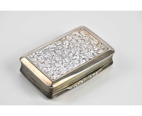NATHANIEL MILLS; a Victorian hallmarked silver snuff box of rectangular form with chased decoration and inscribed panel, Birm