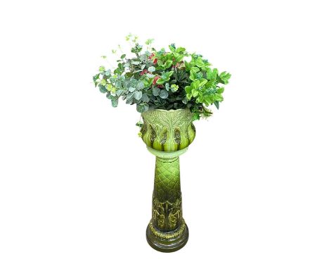 BURMANTOFTS; a faience jardiniere on stand with mottled green glaze, height 85cm.Condition Report: Extensive Crazing to the g
