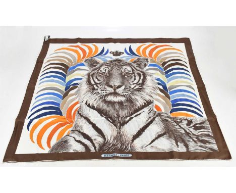 HERMES; a Tigre Royal double face 100% silk twill blue, brown, and orange scarf designed originally in 1977 by Christian Reno