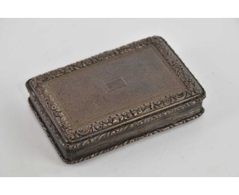 THOMAS EDWARDS; a Victorian hallmarked silver snuff box of rectangular form, with floral cast rim, engine turned decoration a