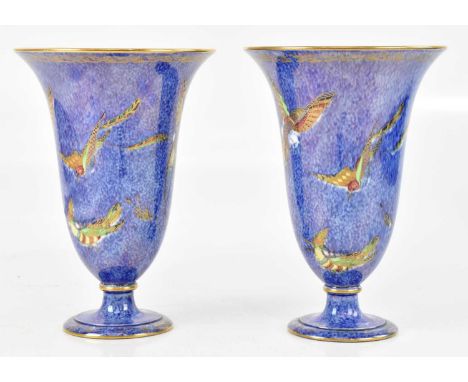 WEDGWOOD; a pair of pedestal lustre trumpet shaped vases, decorated with birds, no. Z5294, height 22cm (2).Condition Report: 
