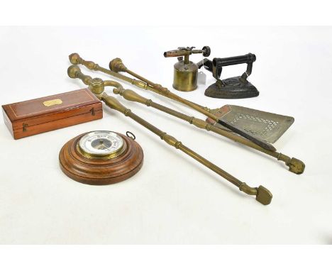 A three piece brass companion set, a circular aneroid barometer, a blow torch, an iron and a Sikes Hydrometer. (7). 