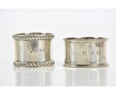 WILLIAM HUTTON &amp; SONS LTD; a Victorian hallmarked silver napkin ring and a further hallmarked silver napkin ring, combine