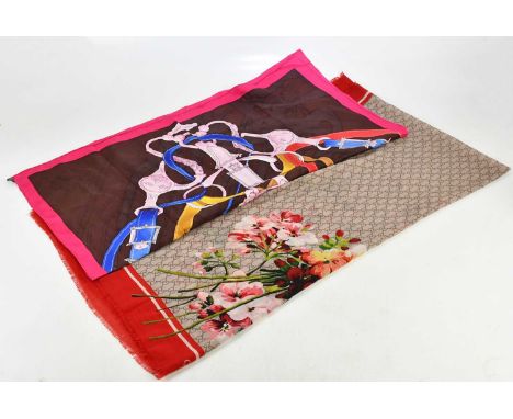 GUCCI; a 100% wool GG monogram scarf, with red fringe edging and large floral design, 180 x 110cm, and a silk 90 x 90cm squar
