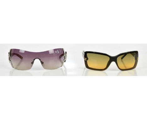 CHANEL; a pair of brown acetate square shaped sunglasses with brown tinted lenses, with interlocking CC gold tone logo to tem