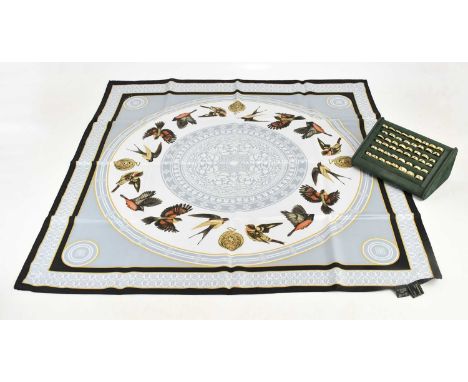 PATEK PHILIPPE; a year scarf, 1999, boxed, and a selection of jeweller's shop display gold plated rings.