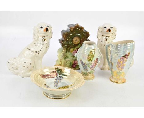 A pair of Victorian style Staffordshire spaniels, height 30cm, three pieces of Kensington Art Deco pottery and a Victorian tr