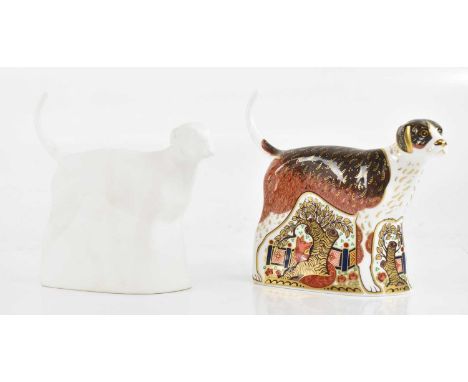 ROYAL CROWN DERBY; an animal form paperweight, 'Foxhound', produced for Sinclairs, length 18cm, with a matching bisque prelim