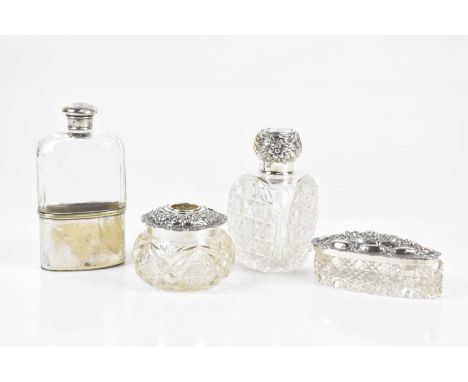 W A ELLWICK LTD; a Victorian hallmarked silver topped hip flask, London 1899, a hallmarked silver topped perfume bottle and t