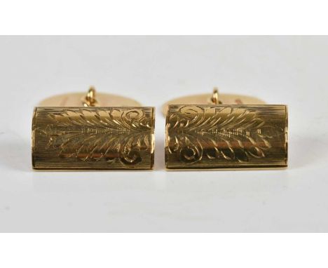 A pair of 9ct yellow gold cufflinks, with chased decoration and engraved initials, combined approx 10.6g, cased.
