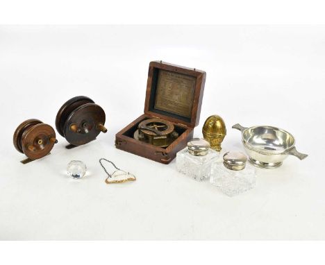 A small group of collectors' items, including two vintage fishing reels, pair of inkwells, silver plated quaich, cased reprod