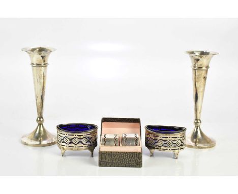 WILLIAMS LTD; a George V hallmarked silver pair of salts, Birmingham 1913, together with a pair of hallmarked silver candlest