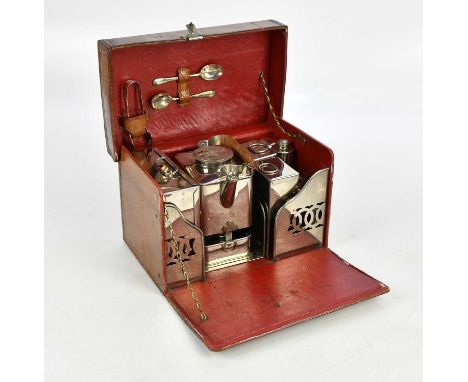A leather cased picnic set, the leather case with embossed initials ‘B.M de J’, the kettle of the metal set with maker's init