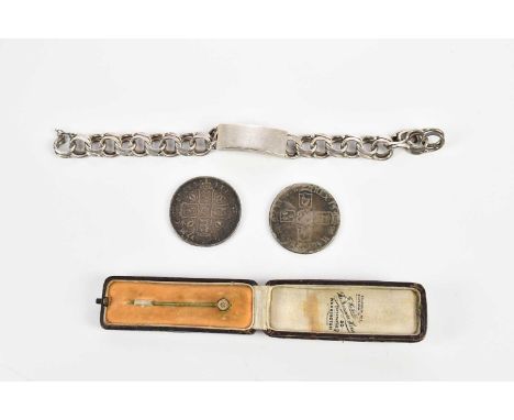 A Charles II silver crown, 1677, a further example, possibly 1696, marks rubbed, a hallmarked silver identity bracelet, appro