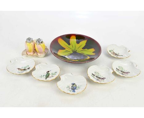 POOLE POTTERY; a red ground plate, a Royal Winton three piece cruet on stand and a set of six Pillivuyt scallop shaped dishes