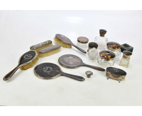 WILLIAM GRIFFITHS &amp; SONS; a George V hallmarked silver and faux tortoiseshell three piece dressing table set Birmingham 1