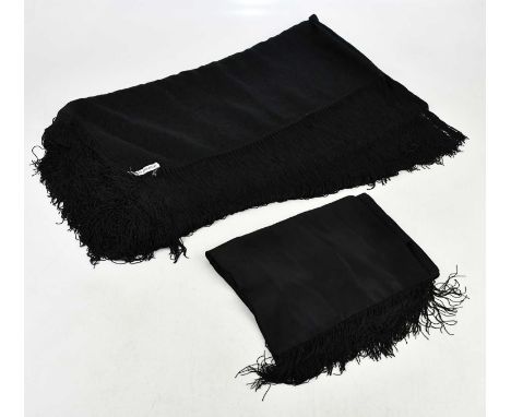 YVES SAINT LAURENT; a black striped long silk evening scarf, with embroidered logo to end and fringing, 152 x 27cm, and an Em