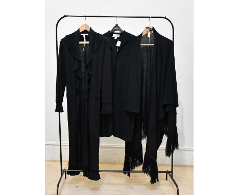 ST JOHN; a black Santana knit long cardigan, with frill detailed trim to bottom and edges, with belt, size US 4, a black Sant