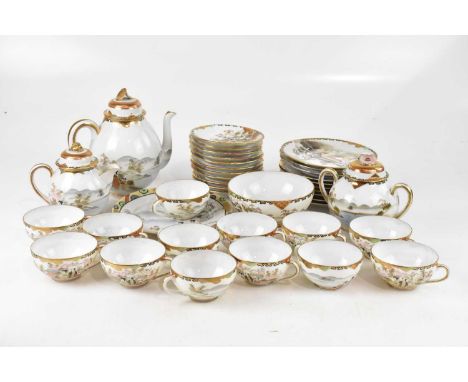 A Japanese eggshell porcelain part tea/dinner service. 