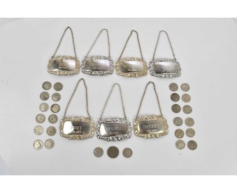HAMPTON UTILITIES; seven hallmarked silver decanter labels for Vodka, Sherry, Gin, Port, Rum, Brandy and Whisky, Birmingham 1