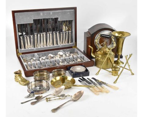 A collection of assorted metalware including an Arts and Crafts chamber stick with embossed decoration, length 28cm, a 1920s 
