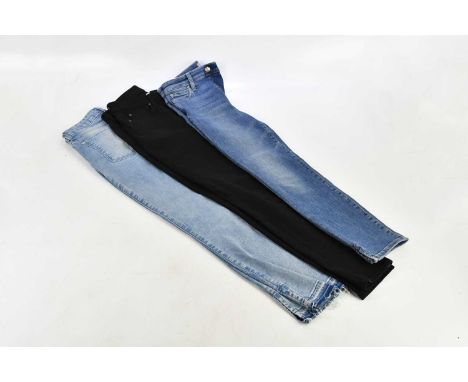 7 FOR ALL MANKIND; a pair of light indigo denim high waist ankle skinny jeans, size 27, a pair of black high waist ankle skin
