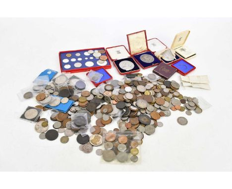 A large collection of British and foreign coins, including a George V part specimen set, commemorative medallions produced by
