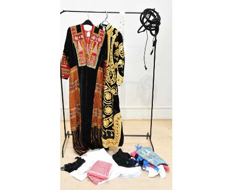 A vintage 1960s maxi length Saudi embroidered wedding dress and a handmade black velvet long kaftan, embroidered with gold an