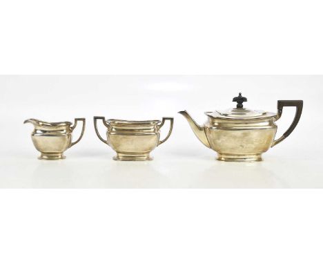 HORACE WOODWARD &amp; CO LTD; a George V hallmarked silver three piece tea service, London 1916, combined approx 25.10ozt/781