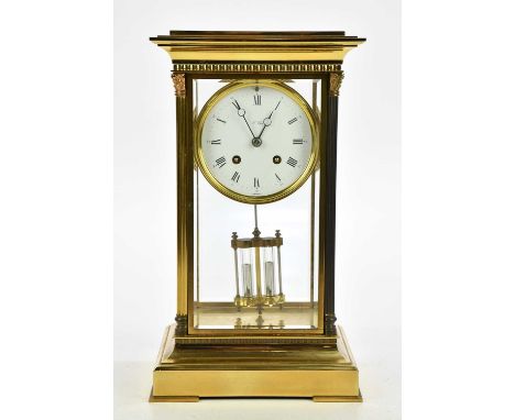 L'EPÉE; a 19th century French brass four glass mantel clock, the enamel dial set with Arabic and Roman numerals, height 33cm,